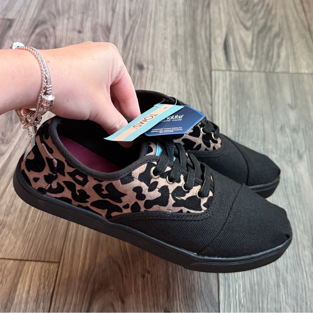 Tom’s sneakers